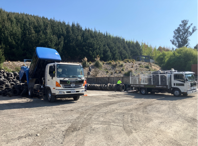 Cadets unloading tyres in the yard in preparation for further processing